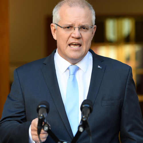 Scomo back in Canberra after being given exemption to travel from Sydney