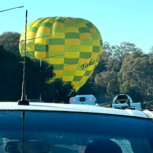 Hot Air Balloon lands on busy Canberra road during peak hour